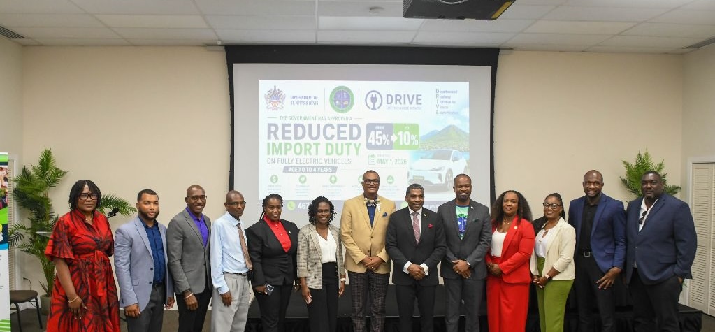 Members of Cabinet along with officials from the Ministry of Energy and the St. Kitts Electricity Company Ltd. celebrate the launch of SOLARISE and DRIVE