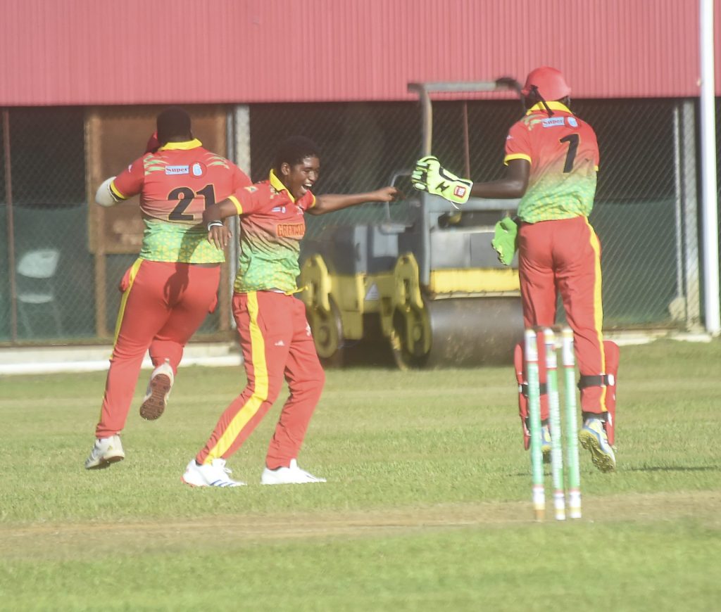 Dominica sits on top of Windward Under-19 cricket after two matches Shamel Hillaire (centre) celebrating thje fall of another wicket (photo- WINLOTT - Robertson S. Henry)